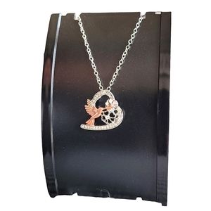 NECKLACE silver toned chain and pendant with daisy & rose gold toned bird NEW
